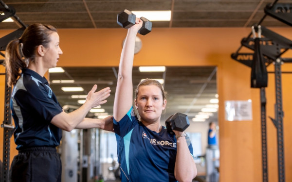 Air Force member receiving one-on-one training